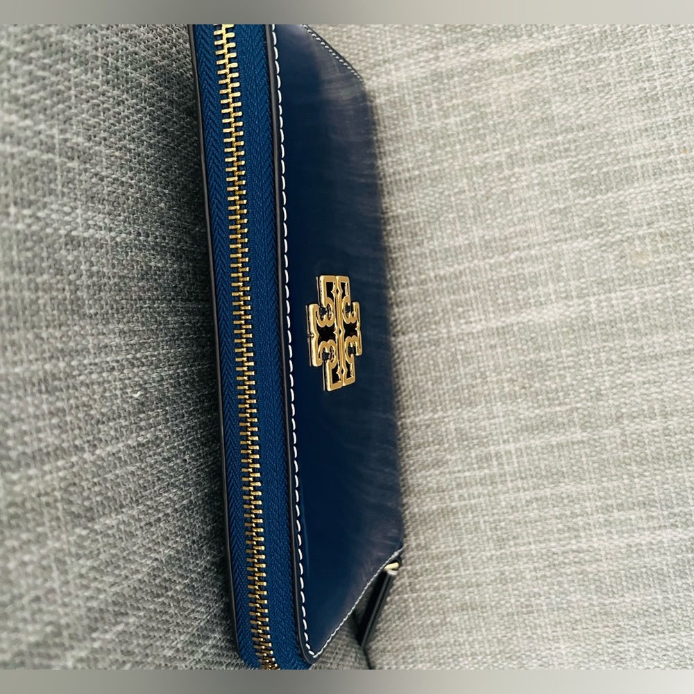 Tory Burch wallet with large gold Tory Burch emblem